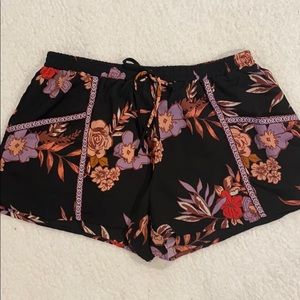 about a girl floral shorts
